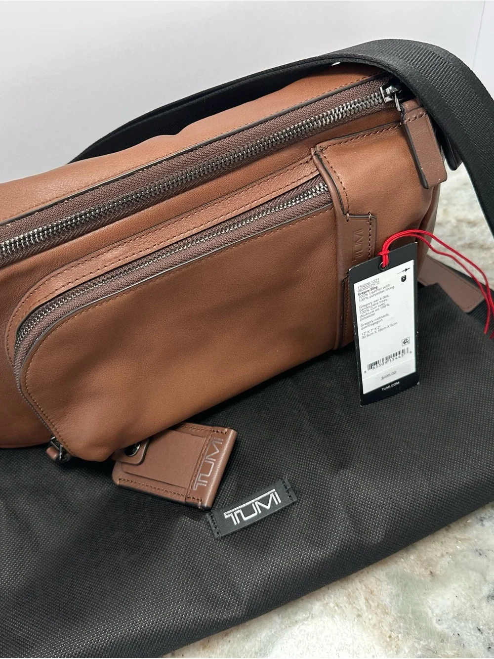 Tumi Brown Leather Belt Bag with Black Strap